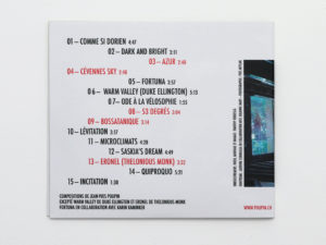 Verso de la couverture d'album de Jazz au grenier de Jean-Yves Poupin. Composition typographique asymétrique avec une alternance de titres en rouge ou en noir.
